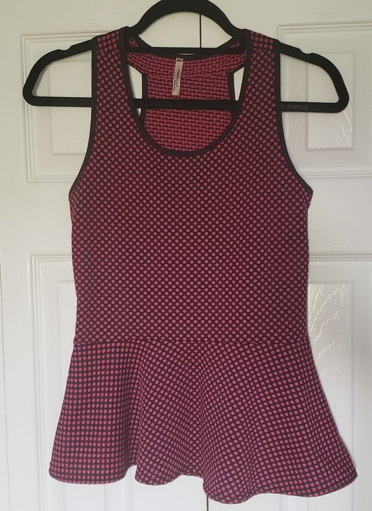 Sensational Collection pink polka dot peplum top